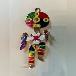Hand painted Mexican tin art, colorful dancer